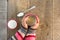 Top view of woman holding coffee mug in hands on rustic country