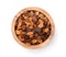 Top view of wooden bowl full of raisins