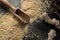 Top view of wooden scoop on a black surface. Spice powder in the kitchen spoon.