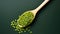 Top view of a wooden spoon with green lentils on a dark emerald background. Healthy vegetarian food, rich in protein and