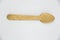 Top View of a Wooden Spoon on a white background. Environmentally Friendly Alternative to Plastic