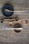 Top view wooden spoons and plates made of precious wood on wooden table, eco-friendly cutlery concept, selective focus