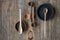 Top view wooden spoons and plates made of precious wood on wooden table, eco-friendly cutlery concept, selective focus