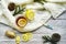 Top view Wooden word sick, Tea with lemon, thermometer, ginger, honey, tablets and dry leaves on a white background. flat lay, spa