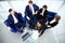 Top view of working business group sitting at table