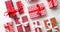 Top view of wrapped Christmas presents laid on the wooden table