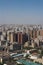 Top view of XI`an city.Panorama. Lots of high-rise buildings, old houses, tennis courts against the blue