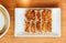 Top view of Yaki-Gyoza set Japanese Pan-Fried Dumplings served on white plate