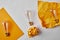 top view of yellow papers with vintage incandescent lamp