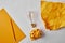 top view of yellow papers with vintage incandescent lamp and pencil