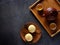 Top view of yolk pastry, mung bean pastry, Oolong tea on black background. With copy space. Flat lay. Taiwan food