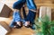 A top view of young couple with cardboard boxes moving in a new home.