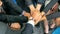 Top view of young people showing their hands on top of each other. Group of businessman making a stack of hands with copy space