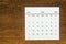 Top views Calendar desk July is the month for organizers to plan and remind on the wooden table background