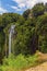 The top waterfalls at Marmore, Umbria, Italy drops vertically amongst the lush greenery