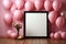 Topdown view pastel pink table, balloonframed frame, confetti perfect birthday flat lay