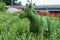 Topiary bush in the form of a donkey.