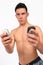 Topless male on his phone