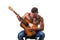 Topless muscular man playing guitar