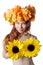 Topless redhead girl with a wreath of colorful flowers