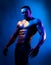 Topless shirtless male model. Naked bodybuilder on Blue neon light.