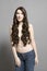 Topless Woman In Jeans With Long Brown Wavy Hair