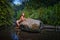 topless woman in the river