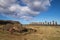 A toppled moai near the moais stone platform of Ahu Tongariki on the south coast of Easter Island. Easter Island, Chile