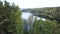 Through the tops of the trees visible of the lake. Aerial survey