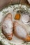 Topview image of croissants and orange marmelade.