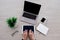 Topview office gadgets  on the wooden desk in office