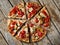 Topview sliced round pizza mushrooms tomatoes