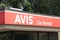 tor, canada - august 20, 2023: avis car rental sign logo store business company facade on bright day 154 p 20 h