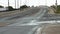 tor, canada - July 18, 2023: vehicles cars going up and down big wet bridge and turning with big truck pass