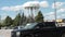 tor, canada - july 31, 2023: city of toronto white water tower with logo clouds parking lot cars skids