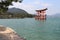 torii in a shinto shrine (itsukushima) in miyajima (japan)