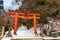 Torii on the side of Daimon Gate in Koyasan, with a path leading to Bentendake Mountain, mount Koya area, Wakayama, Japan