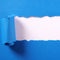 Torn blue paper strip curled edge border white background square