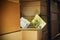 Torn euro money in warehouse room. The crisis of cargo delivery and p