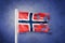 Torn flag of Norway flying against grunge background