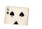 A torn half of a vintage five of spades playing card.