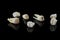Torn human teeth on a black background. Close-up photo of spoiled molars and premolars. Selective focus.