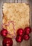 Torn paper on wooden background with ornaments