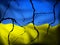 Torn and stained dirty flag of Ukraine
