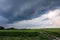 Tornado atmospheric whirlwind in a cumulonimbus thundercloud