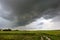 Tornado atmospheric whirlwind in a cumulonimbus thundercloud