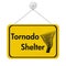 Tornado Shelter message on yellow sign
