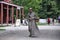 Toronto, Canada - 08 11 2011: A museum worker, clad in 19th-century dress, in front of the Dominion Carriage Works