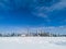 Toronto city skyline seen from toronto Islands over frozen lake Ontario