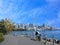 Toronto downtown skyline seen from waterfront park with cycling trail